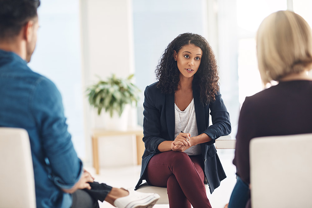 Counsellor speaking to couple